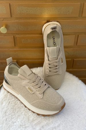 Optez pour les Liu Jo Evelyne 916 beige, la sneaker parfaite pour allier élégance, confort et modernité au quotidien.